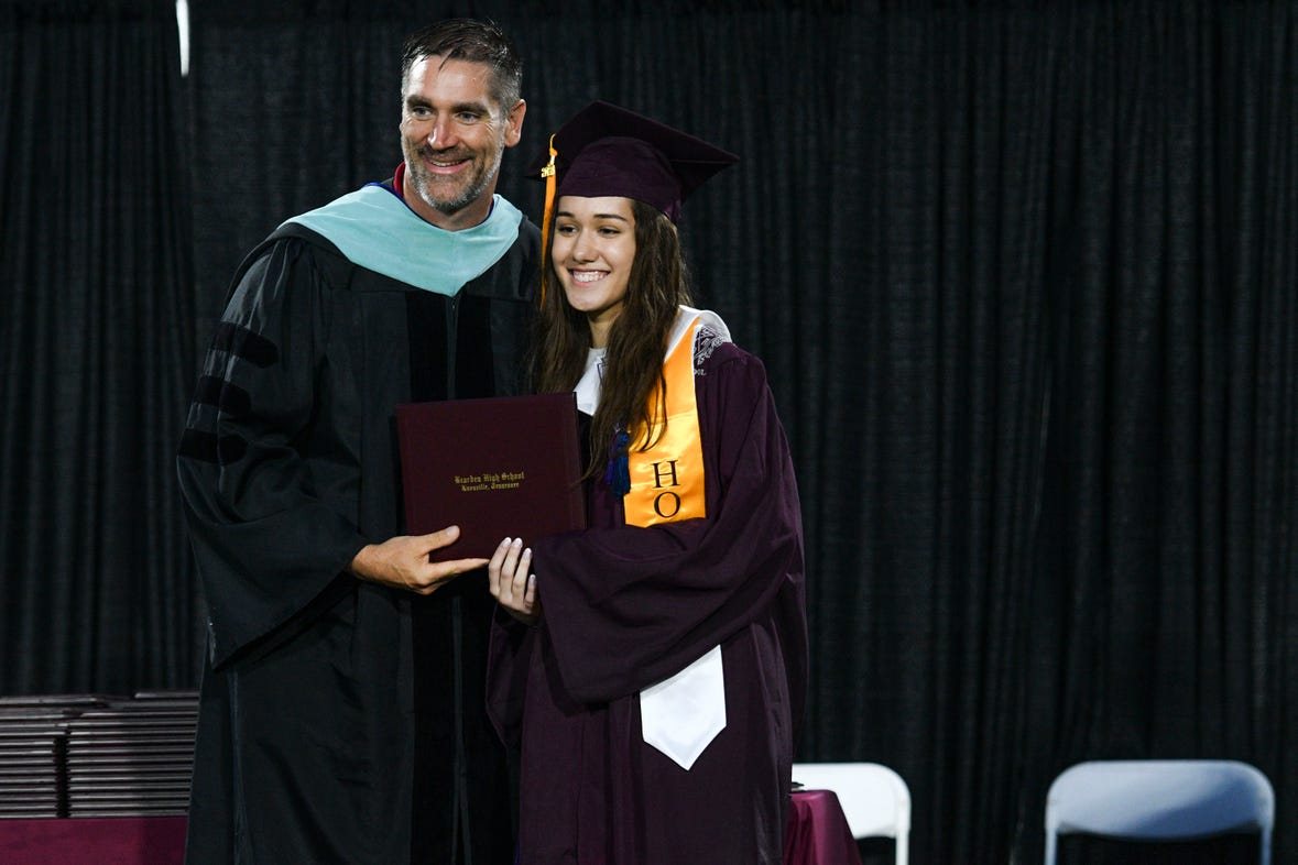 Avigail receiving her diploma